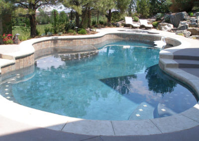 Freeform Swimming Pool With Raised Bond Beams